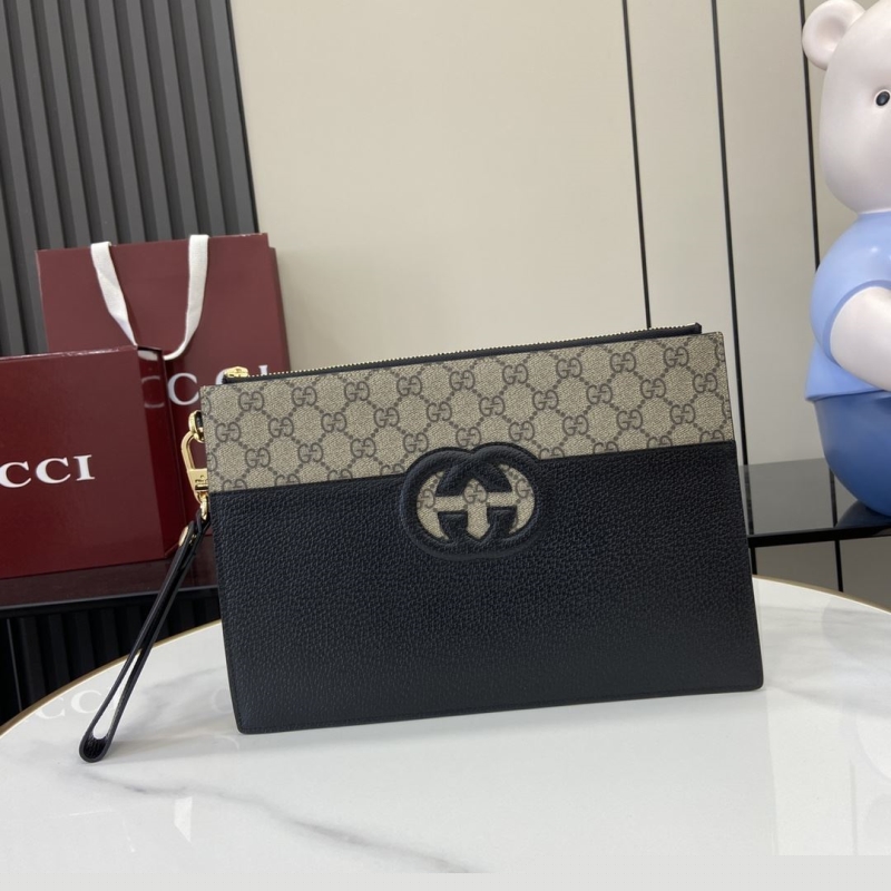 G*u*i clutch bags